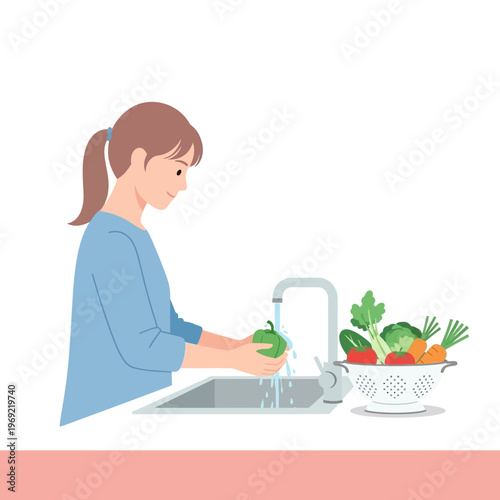 Woman washing fresh vegetables and fruits in kitchen sink for healthy meal preparation