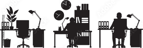 Silhouette of people working at office desks with computers