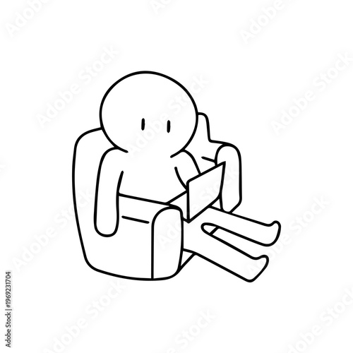 Young caucasian male using a laptop while relaxing