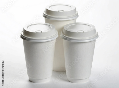 Three Blank White Paper Coffee Cups Mockup: To-Go Disposable Beverage Cups with Lids Isolated on White Background