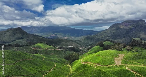 Wallpaper Mural Cinematic long aerial view of Tea Plantation hill valley in Munnar, Kerala, India. Aerial view of a tea plantation in Munnar. The beautiful Western Ghats mountain range in Kerala Torontodigital.ca