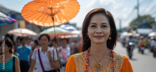 Woman in orange traditional dress.