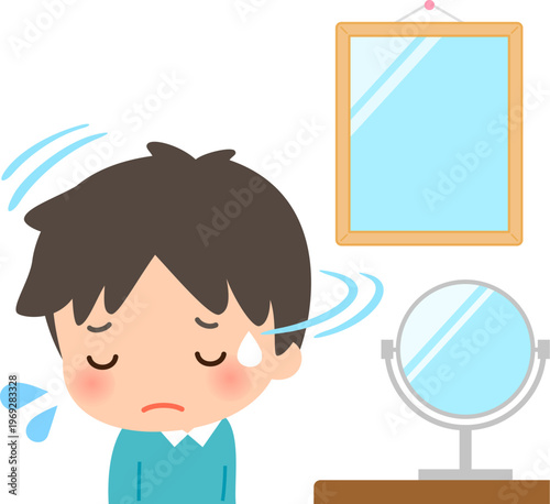 鏡から顔を背ける若い男性