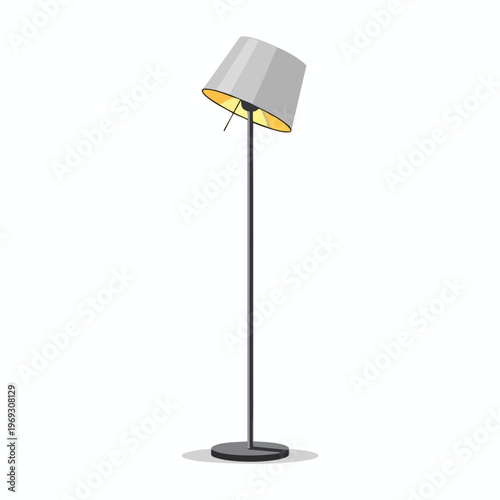 A tall, modern floor lamp with a tilted gray shade and warm yellow light