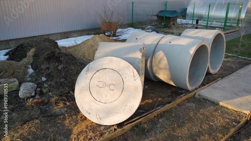 Wallpaper Mural Concrete drainage pipes stored at outdoor construction yard close-up tracking shot Torontodigital.ca