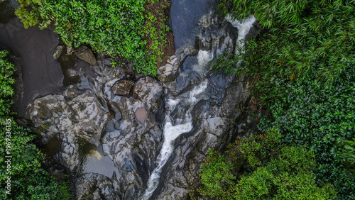 Εκτύπωση καμβά Aerial view of Clear mountain stream running through a rocky riverbed, Nature la