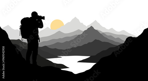 Silhouette of a photographer capturing landscape views with mountains and sun
