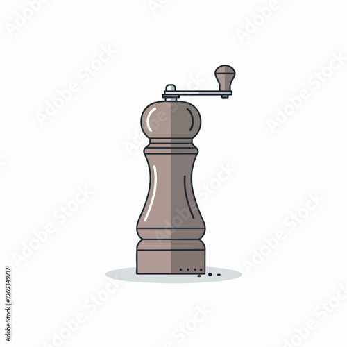 A sleek, modern pepper grinder stands tall, dispensing fine grounds onto a surface