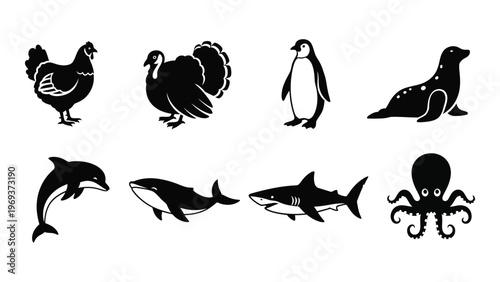 A collection of various black animal silhouettes including birds marine mammals and fish are displayed on a white background silhouette