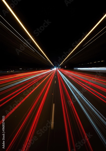 Dynamic abstract backdrop created by vibrant, speeding vehicle light trails, forming energetic streaks and lines against a completely dark night environment, high-speed, dark background, glowing