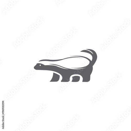 A tenacious and minimalist logo in charcoal grey depicting a honey badger.