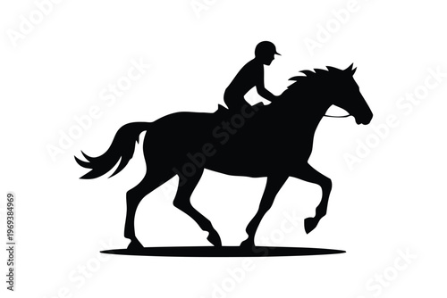 Silhouette of jockey riding a galloping horse
