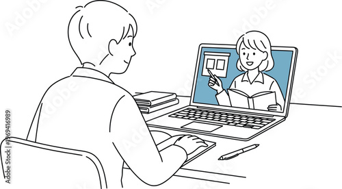 Student engaged in online learning with a teacher on a laptop