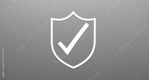 White shield outline featuring an evident tick mark inside