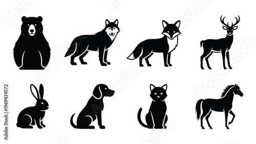 A collection of diverse animal figures including a bear wolf deer and rabbit presented in stark black silhouette high quality professional