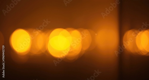 Vibrant yellow light bokeh overlay on minimal abstract surface