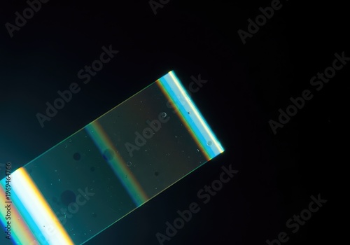 Dynamic abstract background showing intense spectral light reflections and colorful geometric shapes created by optical refraction effects ,optical ,minimal ,modern