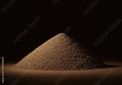 Heap of rough material creating an interesting texture and shadow pattern, isolated against a uniform dark sepia brown background ,heap ,background ,mound