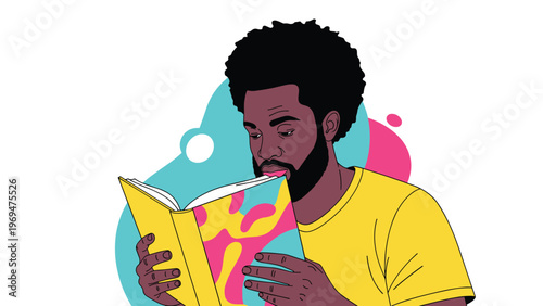 Focused young man with a black beard reading an interesting book with a colorful cover on a bright day in a quiet room alone.