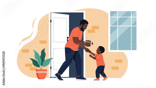 Cheerful father returning home and greeting his excited young son with a brown leather american football for an outdoor game.