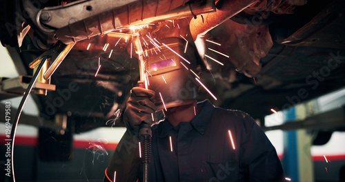 Bild auf Leinwand Mechanic, welding and person with tools by car for diagnostics, maintenance or auto service