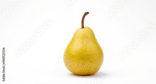 Single ripe pear against a ...