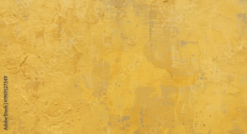weathered yellow stucco wal...