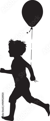 Silhouette of a young boy running while holding the string of a floating balloon.