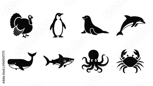 A collection of black silhouettes depicting various marine and avian animals including a penguin dolphin and octopus silhouette high quality professional