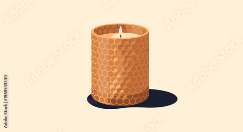 Elegant scented candle burning inside a decorative jar featuring a textured golden honeycomb pattern casting a soft shadow.