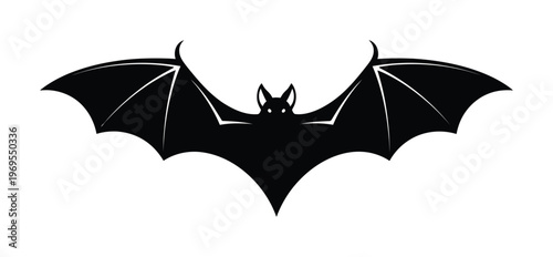 Vector of a bat with spread wings and ears in flight