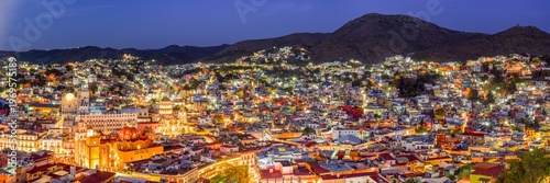Panoramic view of the colorful cityscape of Guanajuato, Mexico at night