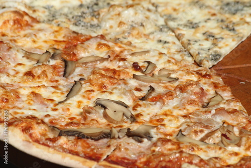 Appetizing Ham, Mushroom, Four Cheese Pizza Close-up
