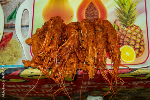 Golden brown whole prawns fried crispy with spiced masala