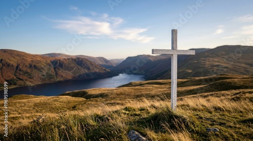 Wooden Cross on Hill Overlooking Calm Lake at Sunrise With Mountain Landscape and Peaceful Sky