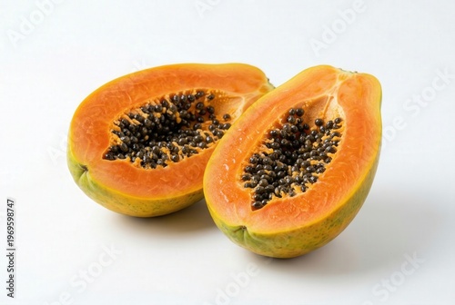 Fresh papaya halves cutout isolated