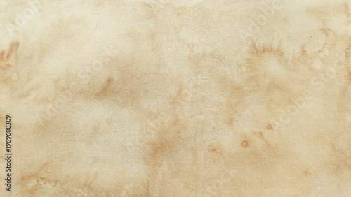 Vintage brown paper background with aged stains texture. Antique parchment paper texture with brown vintage background.