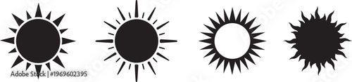 Four sequential stages of a black and white sun transitioning through phases rays
