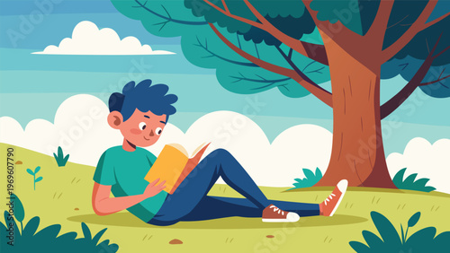 Boy reading a book under a tree in a grassy area during the day with clouds in the sky