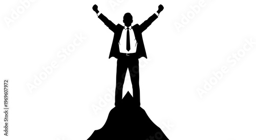 Silhouette of a triumphant businessman standing on a mountain peak
