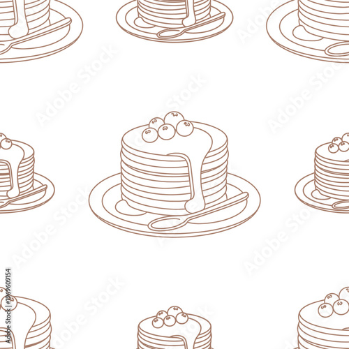 pancakes with syrup and fruit on plates