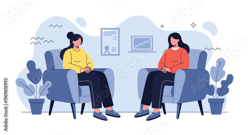 Two women sitting in comfortable armchairs while having a therapy session or a professional conversation in a blue office.