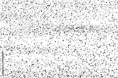 白背景に広がる黒い粒のテクスチャ素材