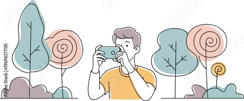 Man Photographing Trees with Smartphone in Nature