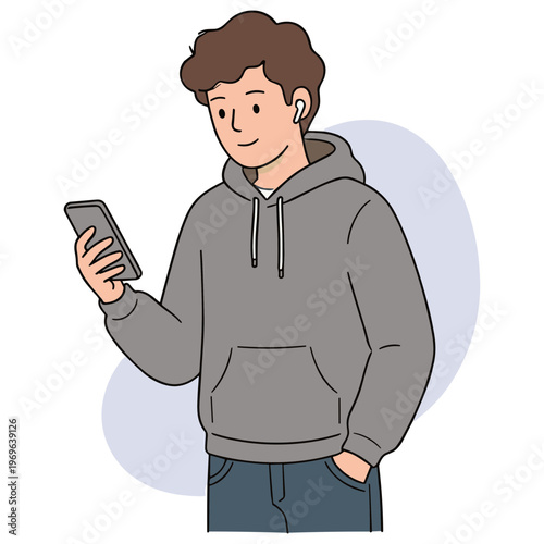A young man wearing a hoodie looks at his smartphone with a relaxed expression.