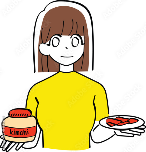 Woman holding a jar and plate of kimchi