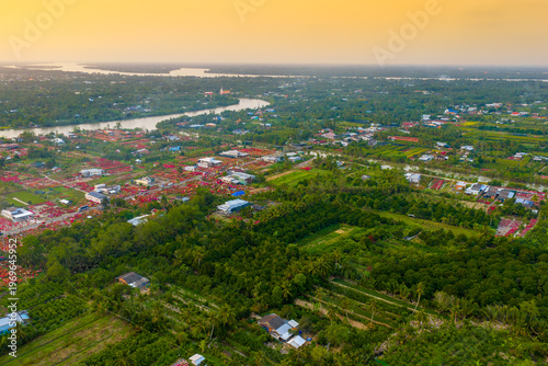 Aerial view of Phu Son village of bougainvillea blooms throughout Ben Tre, Vietnam
