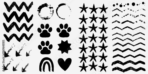 Collection of hand drawn black brushstroke shapes and patterns on white
