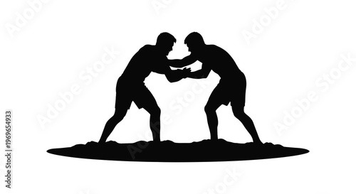 Two wrestlers intensely grappling in a competitive match a striking silhouette