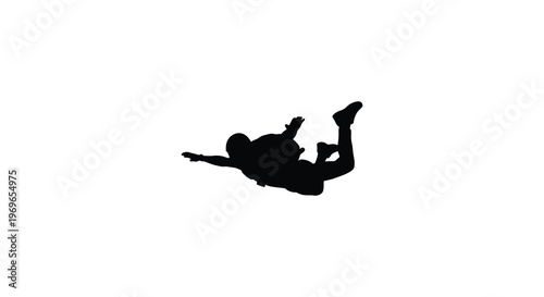 A child playfully tumbles forward in a dynamic black silhouette